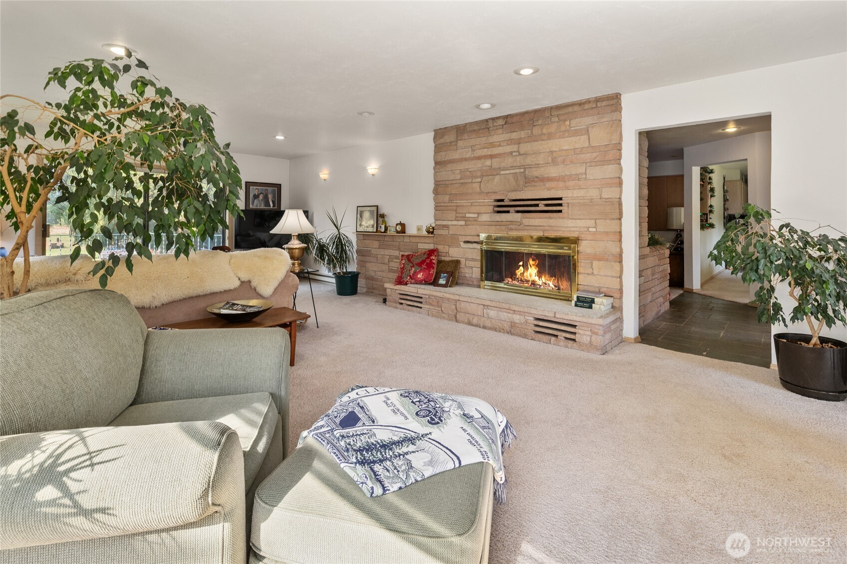 911 Westside Road Cle Elum, WA 98922 - Photo 10 of 40 a living room with furniture and a fireplace