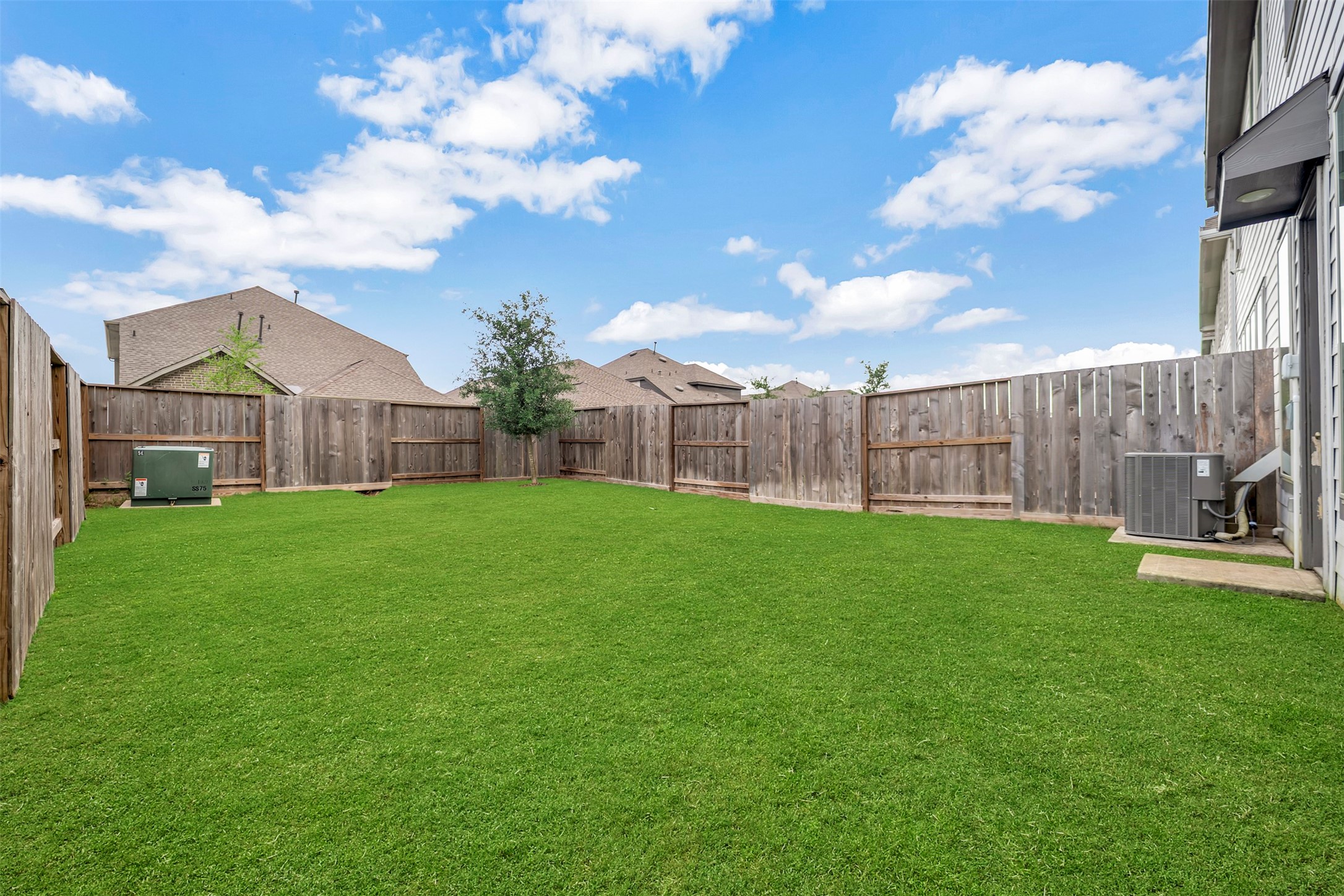 4127 Champlain Way Iowa Colony, TX 77583 - Photo 30 of 35 a view of yard with house and green space