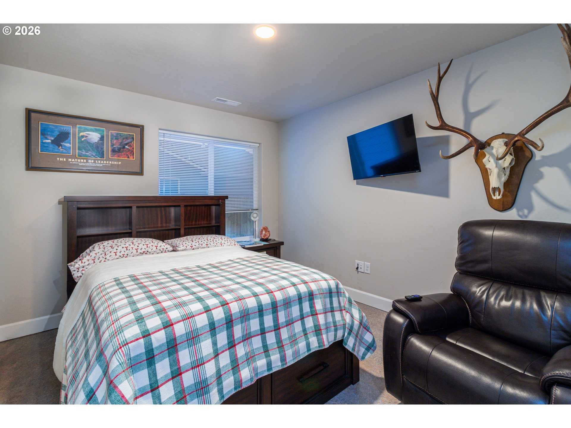 529 East Legacy Avenue Hermiston, OR 97838 - Photo 14 of 30 a bedroom with a bed and chair