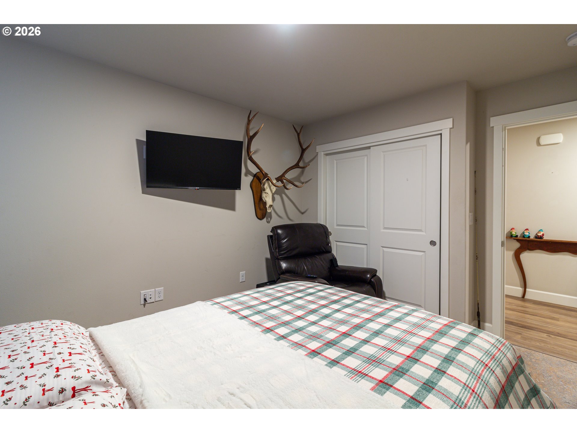 529 East Legacy Avenue Hermiston, OR 97838 - Photo 15 of 30 a bedroom with a bed and a flat screen tv