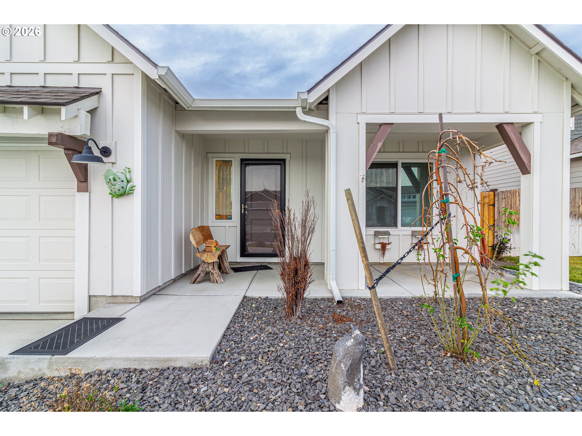 529 East Legacy Avenue Hermiston, OR 97838 - Photo 3 of 30 a backyard of a house with barbeque oven table and chairs