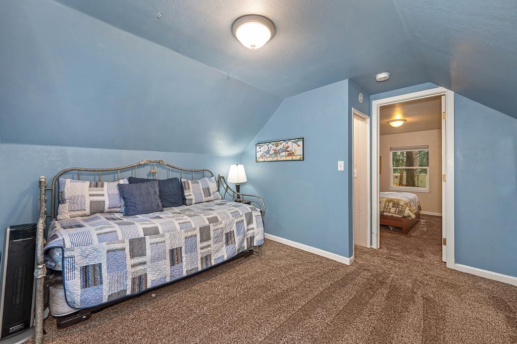 6252 Pony Express Trail Pollock Pines, CA 95726 - Photo 31 of 43 a bedroom with a bed and a view of bedroom