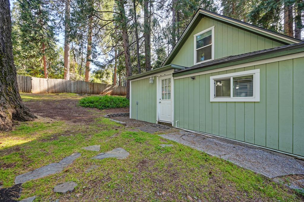 6252 Pony Express Trail Pollock Pines, CA 95726 - Photo 34 of 43 a view of backyard of house with green space