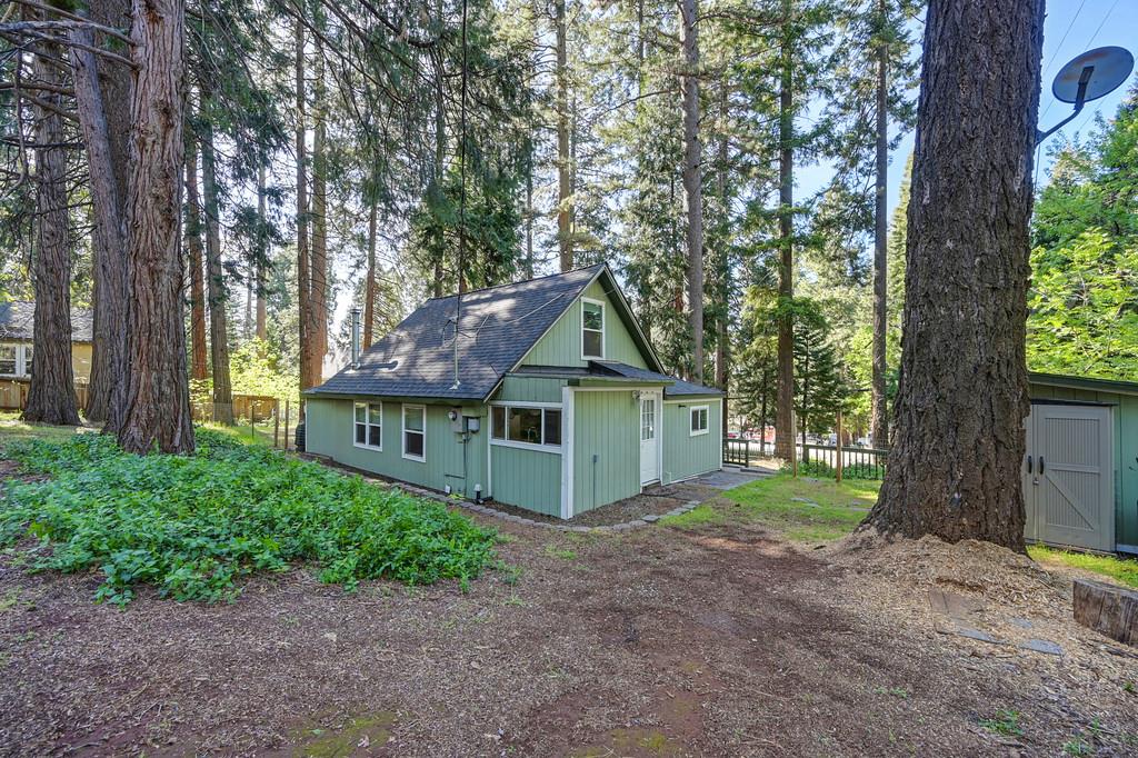 6252 Pony Express Trail Pollock Pines, CA 95726 - Photo 37 of 43 a house view with a garden space