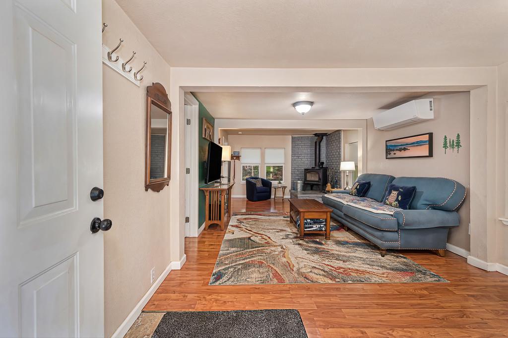 6252 Pony Express Trail Pollock Pines, CA 95726 - Photo 9 of 43 a living room with furniture and a rug