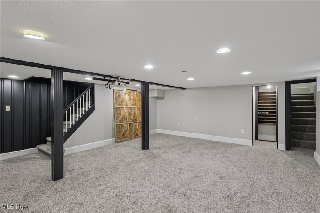 128 Overwood Road Akron, OH 44313 - Photo 36 of 40 Finished below grade area with stairway, carpet floors, and recessed lighting
