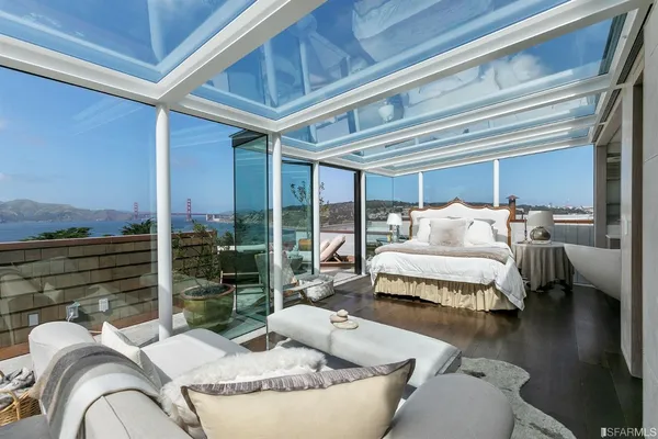 a view of a living room and entry way