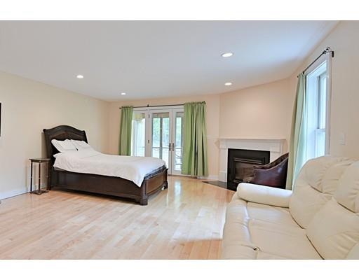 46 Meadow Road Bolton, MA 01740 - Photo 12 of 29 a living room with furniture and a fireplace
