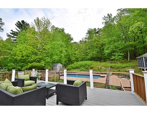 46 Meadow Road Bolton, MA 01740 - Photo 17 of 29 a view of a chair and tables the patio