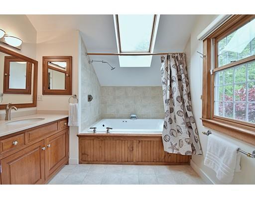 46 Meadow Road Bolton, MA 01740 - Photo 18 of 29 a bathroom with a tub sink and a mirror
