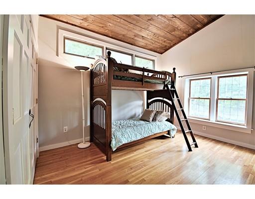 46 Meadow Road Bolton, MA 01740 - Photo 19 of 29 a view of a bedroom with wooden floor and a window