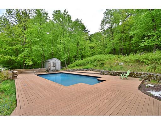 46 Meadow Road Bolton, MA 01740 - Photo 24 of 29 a view of swimming pool from a lounge chair