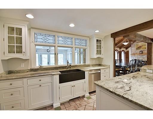 46 Meadow Road Bolton, MA 01740 - Photo 4 of 29 a kitchen with granite countertop cabinets and window