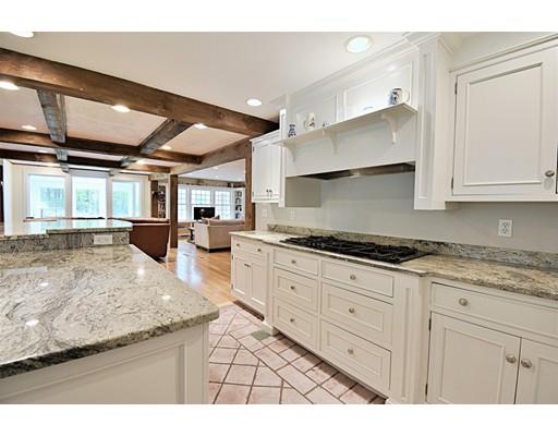46 Meadow Road Bolton, MA 01740 - Photo 5 of 29 a kitchen with granite countertop a sink and cabinets