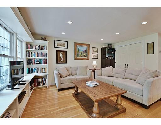 46 Meadow Road Bolton, MA 01740 - Photo 8 of 29 a living room with furniture and a book shelf