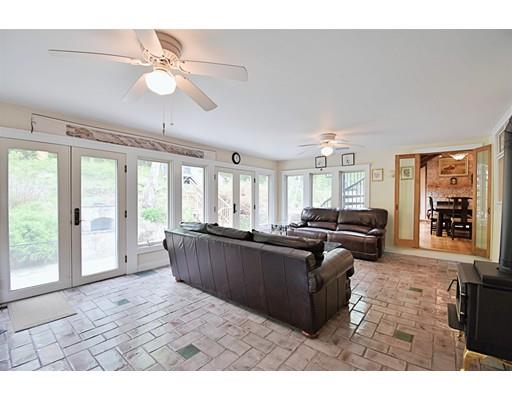 46 Meadow Road Bolton, MA 01740 - Photo 10 of 29 a living room with furniture and a large window