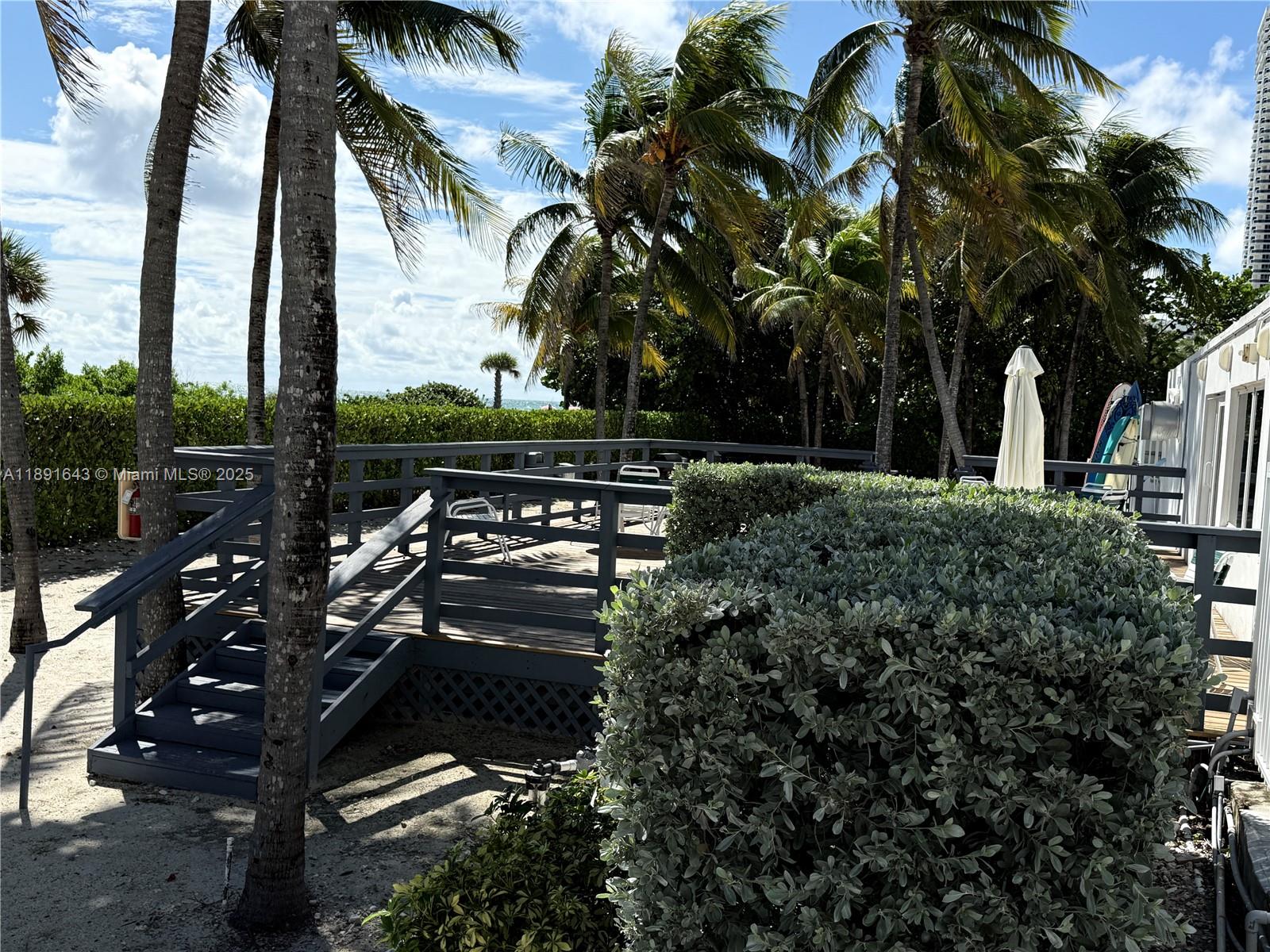 5005 Collins Avenue, Unit 823 Miami Beach, FL 33140 - Photo 21 of 34 a view of outdoor space with seating area