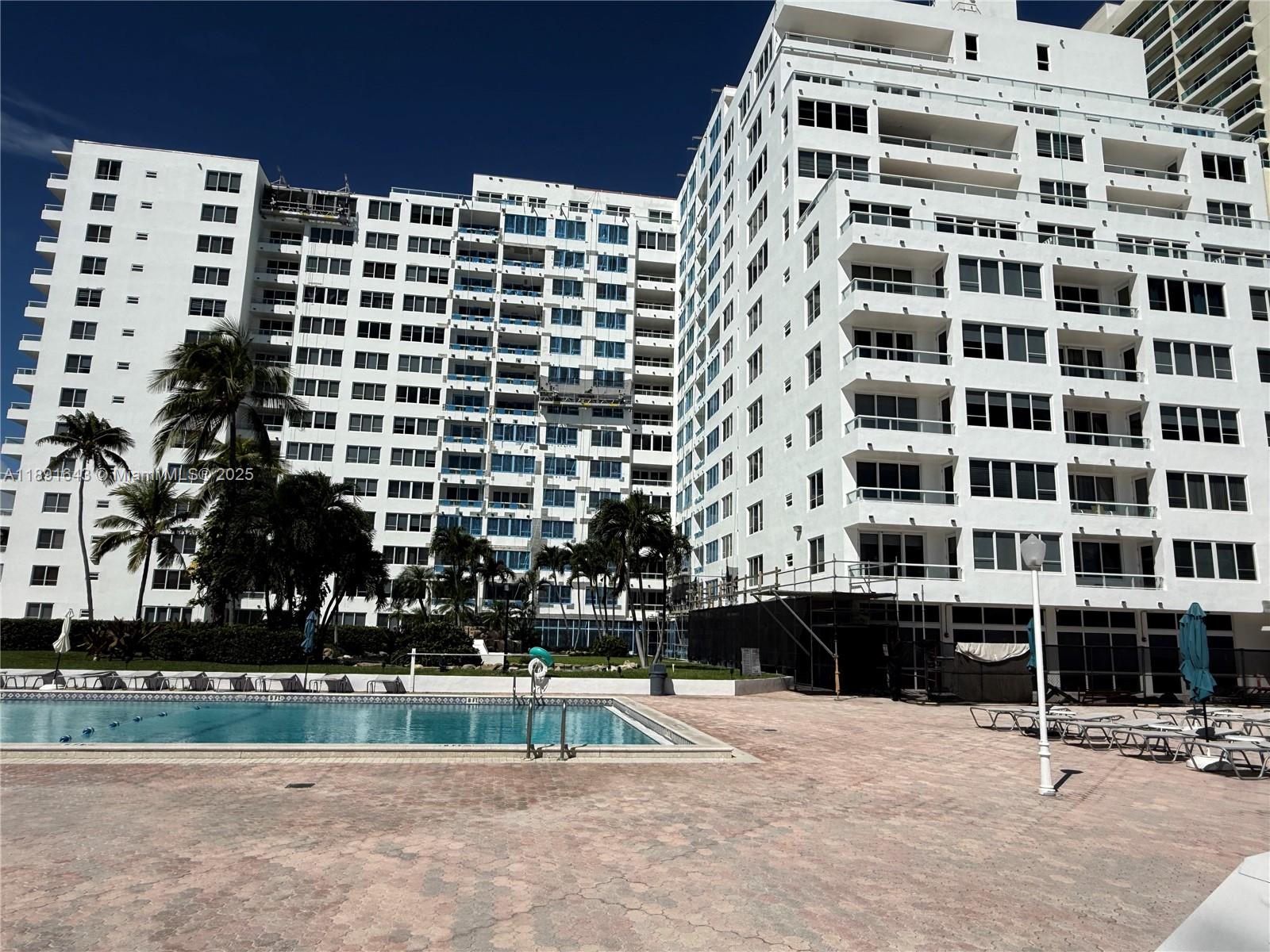 5005 Collins Avenue, Unit 823 Miami Beach, FL 33140 - Photo 9 of 34 a view of a building with a outdoor space