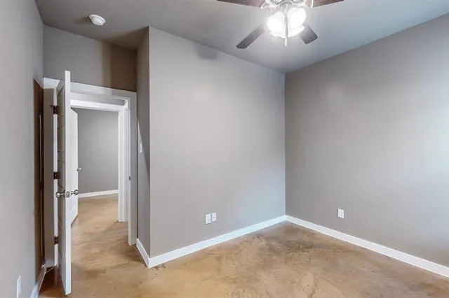 an empty room with a bathroom