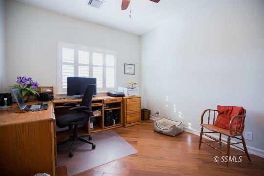 2401 Lacey Street Ridgecrest, CA 93555 - Photo 27 of 44 a view of a workspace with furniture and a window