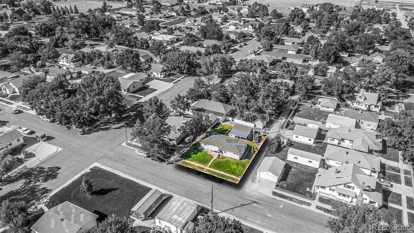 251 West 5th Street Akron, CO 80720 - Photo 28 of 30 an aerial view of multiple house with yard