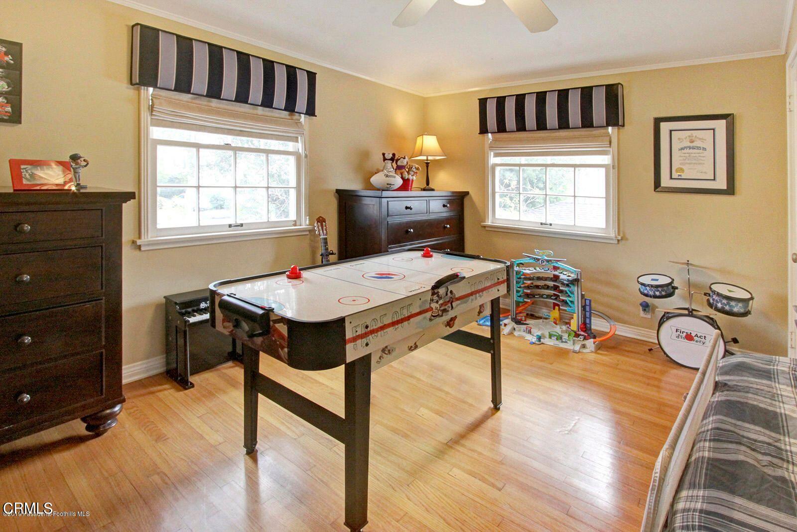 175 Glen Summer Road Pasadena, CA 91105 - Photo 18 of 26 a view of a workspace with furniture and a window