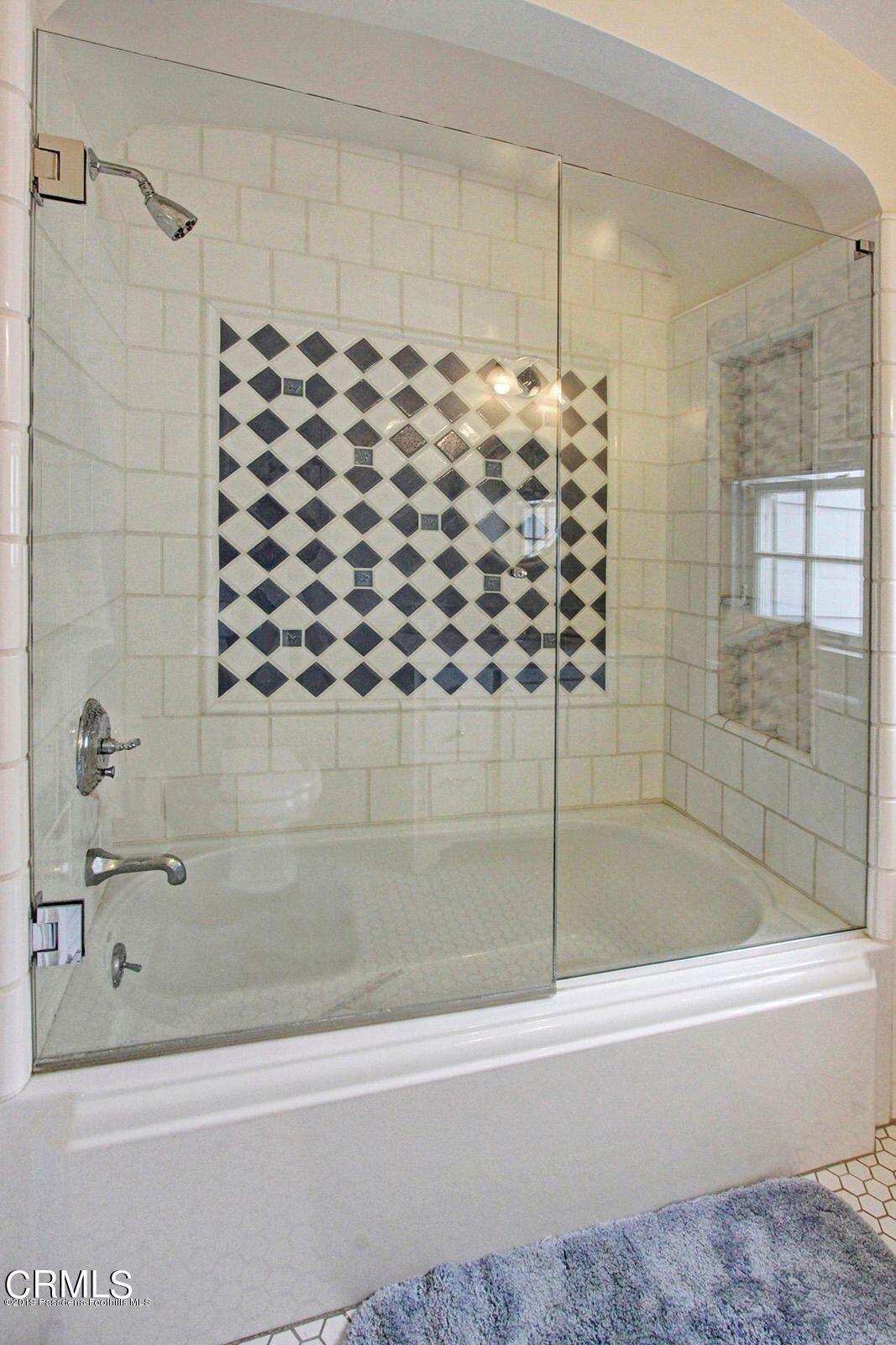175 Glen Summer Road Pasadena, CA 91105 - Photo 20 of 26 a bathroom with a bathtub and shower