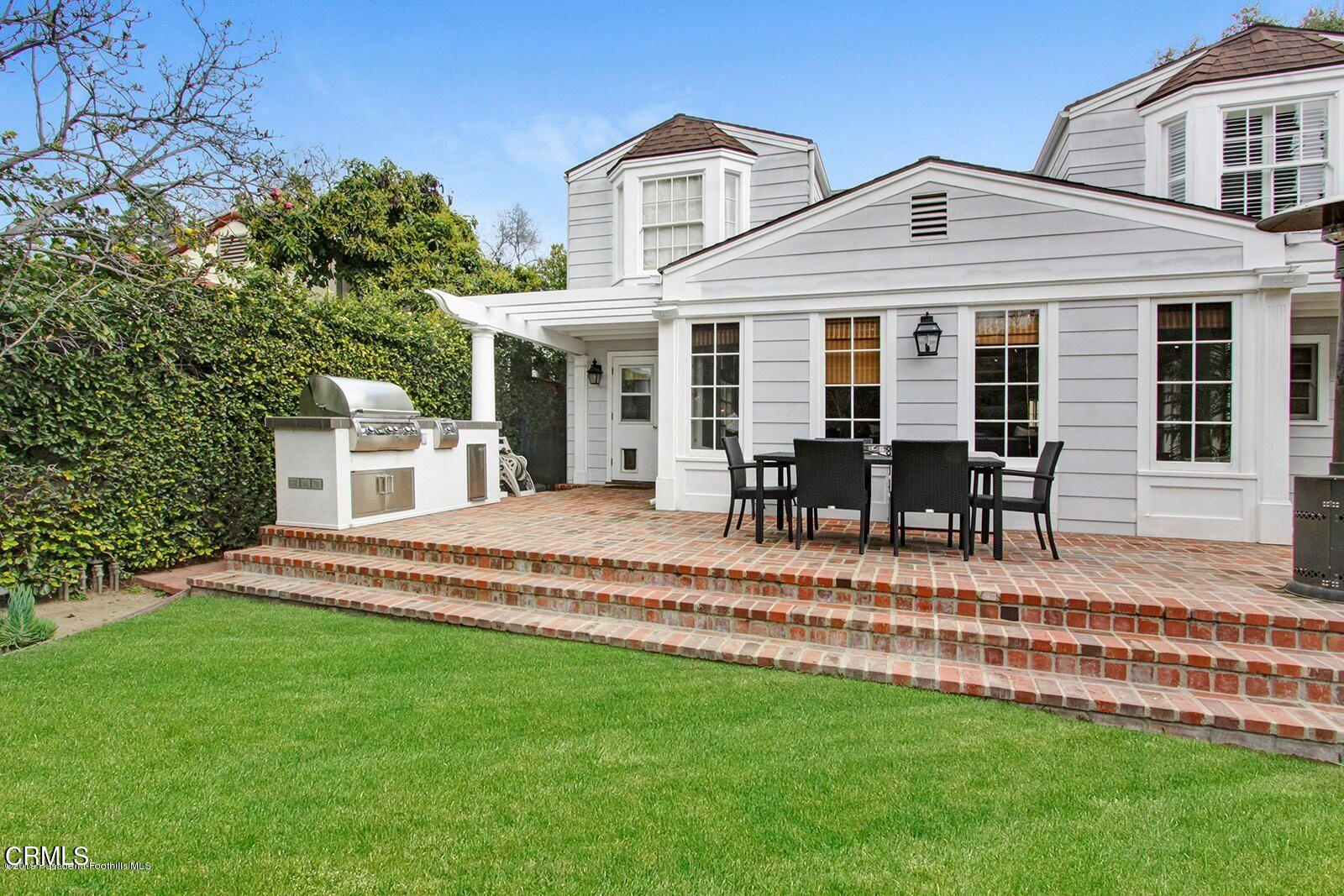 175 Glen Summer Road Pasadena, CA 91105 - Photo 24 of 26 a view of a house with a yard and sitting area
