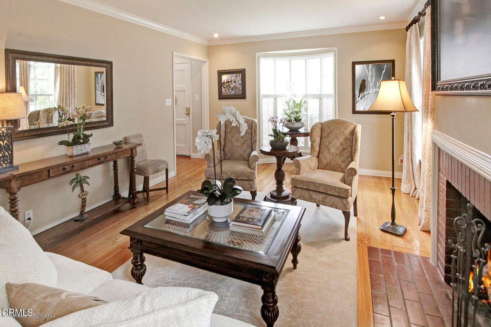 175 Glen Summer Road Pasadena, CA 91105 - Photo 4 of 26 a living room with furniture and a fireplace