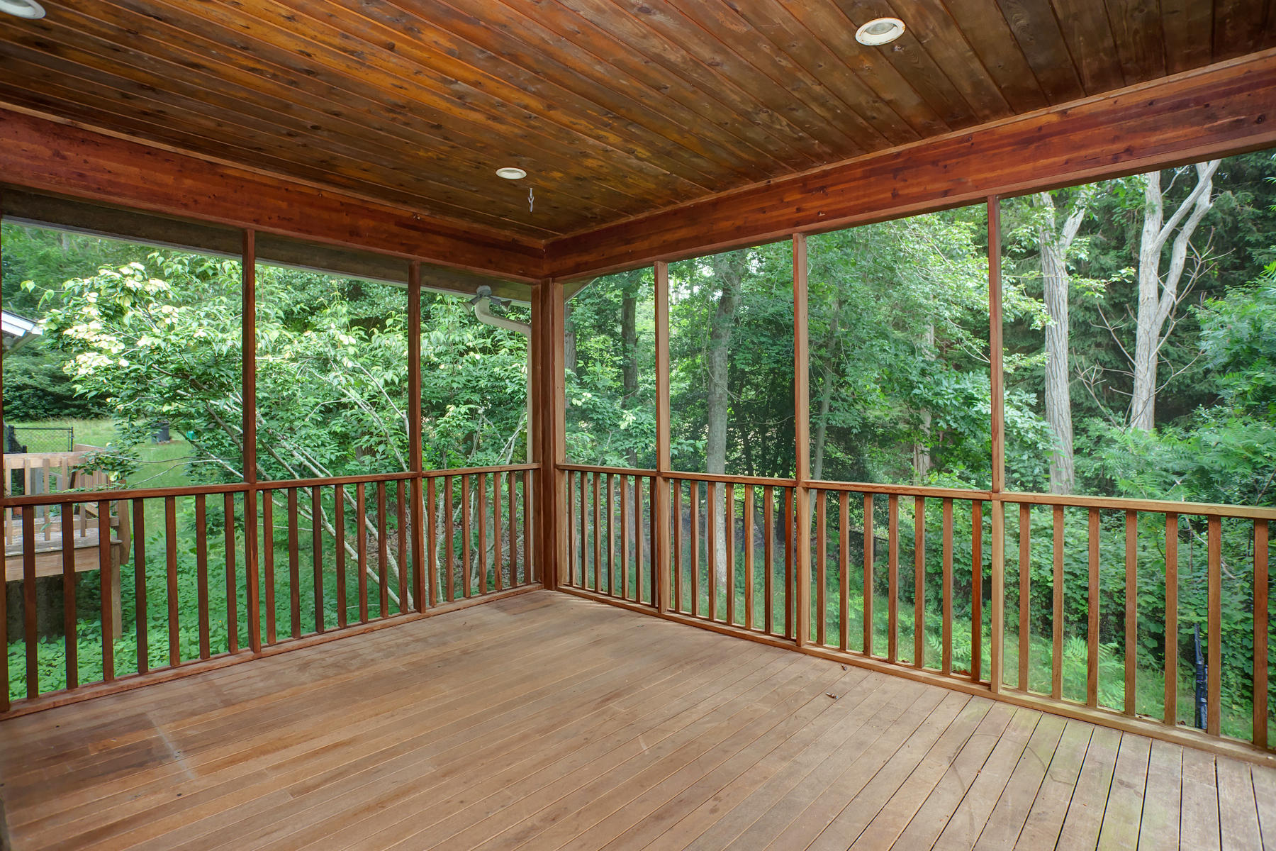 170 Pimlico Pond Road Mashpee, MA 02649 - Photo 15 of 29 a balcony with trees in front of it