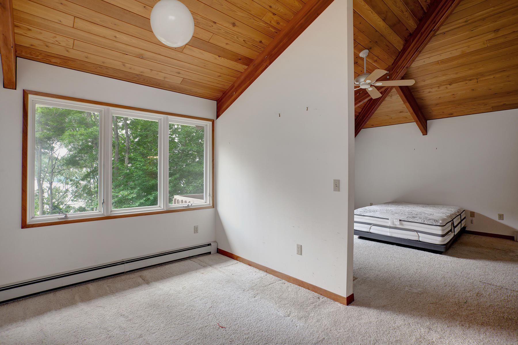 170 Pimlico Pond Road Mashpee, MA 02649 - Photo 21 of 29 a view of room with window and a ceiling fan