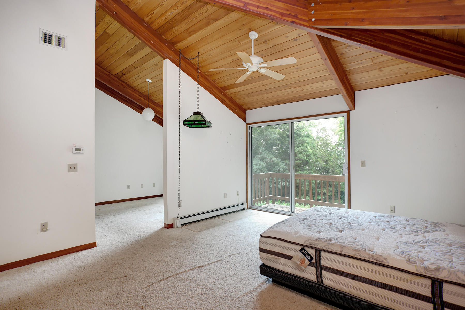 170 Pimlico Pond Road Mashpee, MA 02649 - Photo 22 of 29 a room with a bed and a window