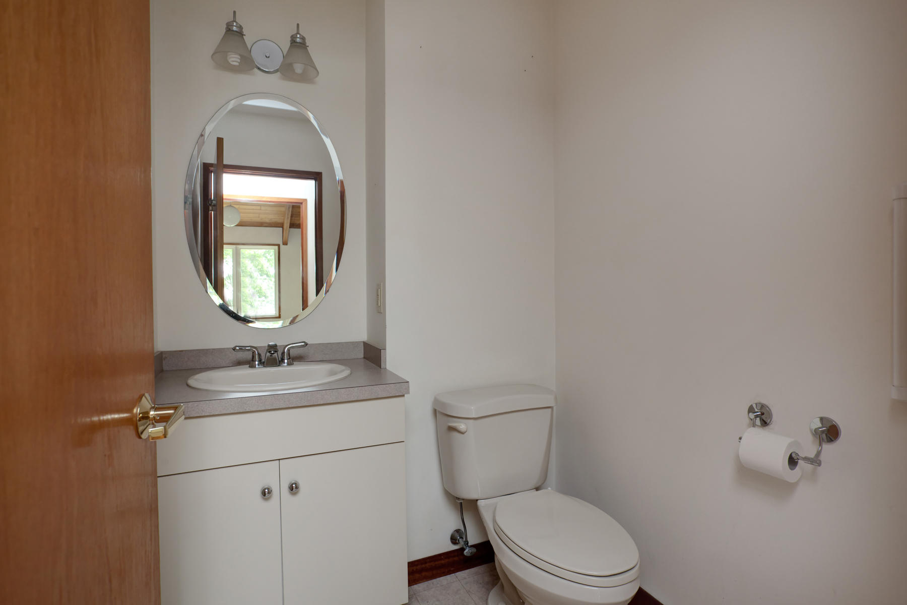 170 Pimlico Pond Road Mashpee, MA 02649 - Photo 26 of 29 a bathroom with a toilet sink vanity granite and mirror