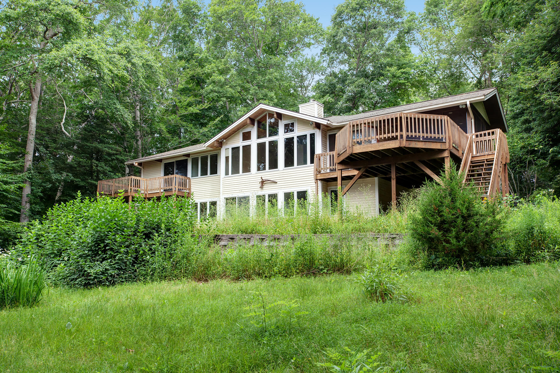 170 Pimlico Pond Road Mashpee, MA 02649 - Photo 3 of 29 a front view of a house with a yard