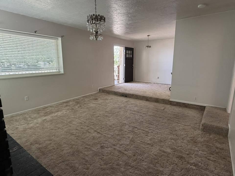 195 South 100 E Street Beaver, UT 84713 - Photo 2 of 23 Living Room and Entry