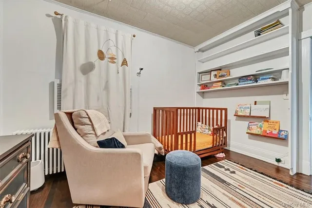 a balcony with couch and chairs