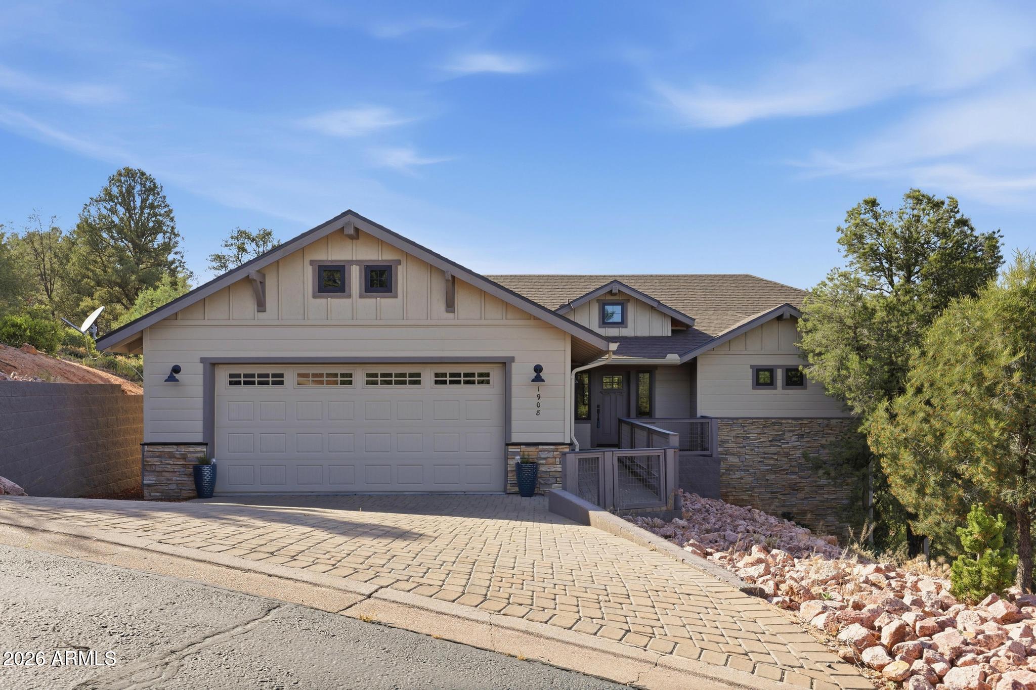1908 East Starlight Pass Payson, AZ 85541 - Photo 5 of 30 a front view of a house with a yard and garage