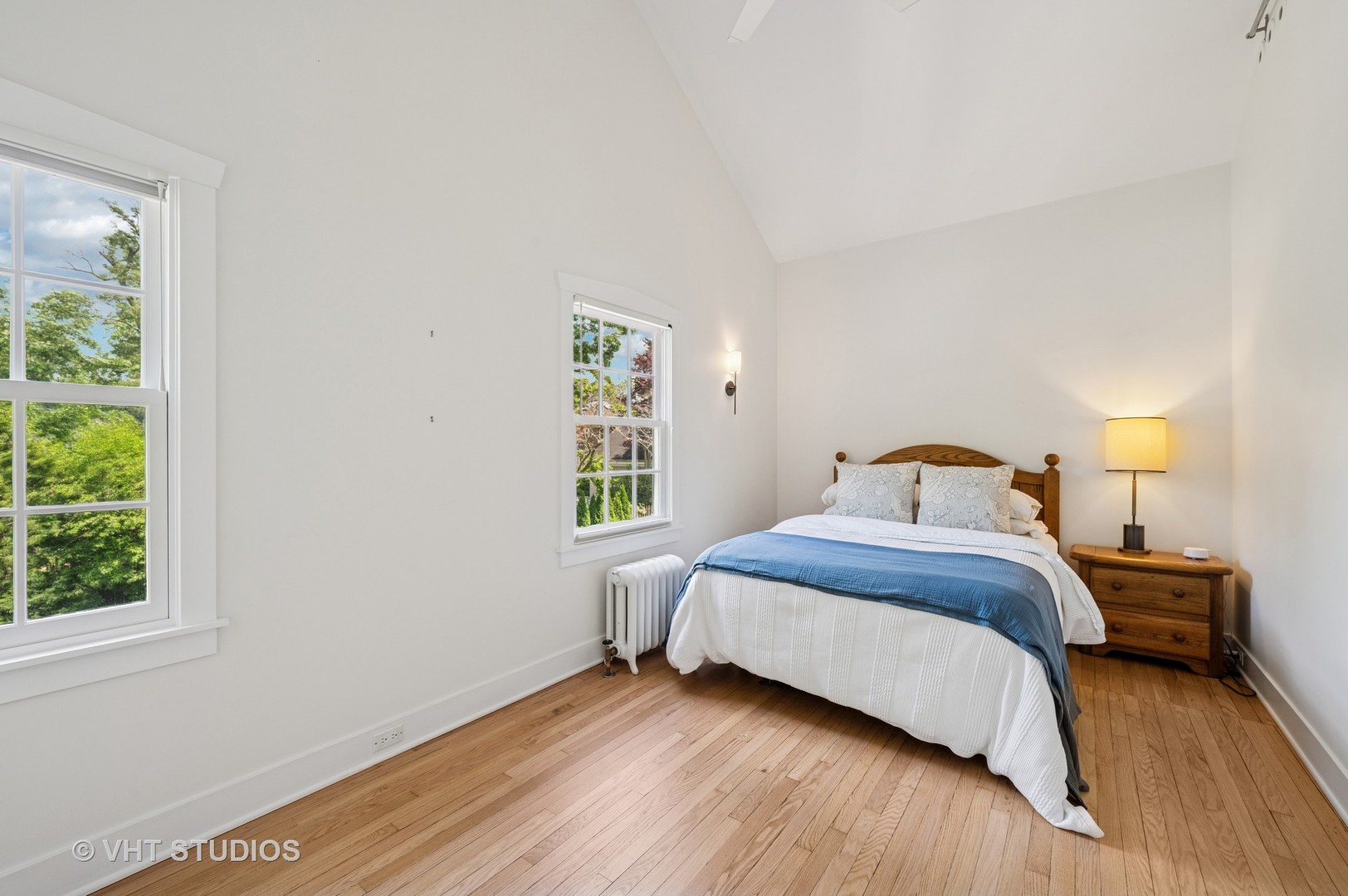 720 Willow Road Winnetka, IL 60093 - Photo 11 of 28 a bedroom with a bed and a window