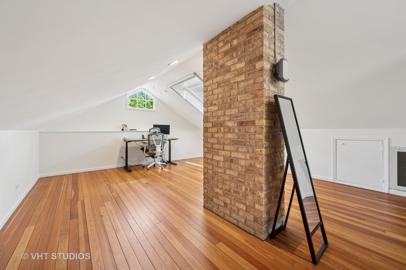 720 Willow Road Winnetka, IL 60093 - Photo 17 of 28 a view of empty room with wooden floor and stairs