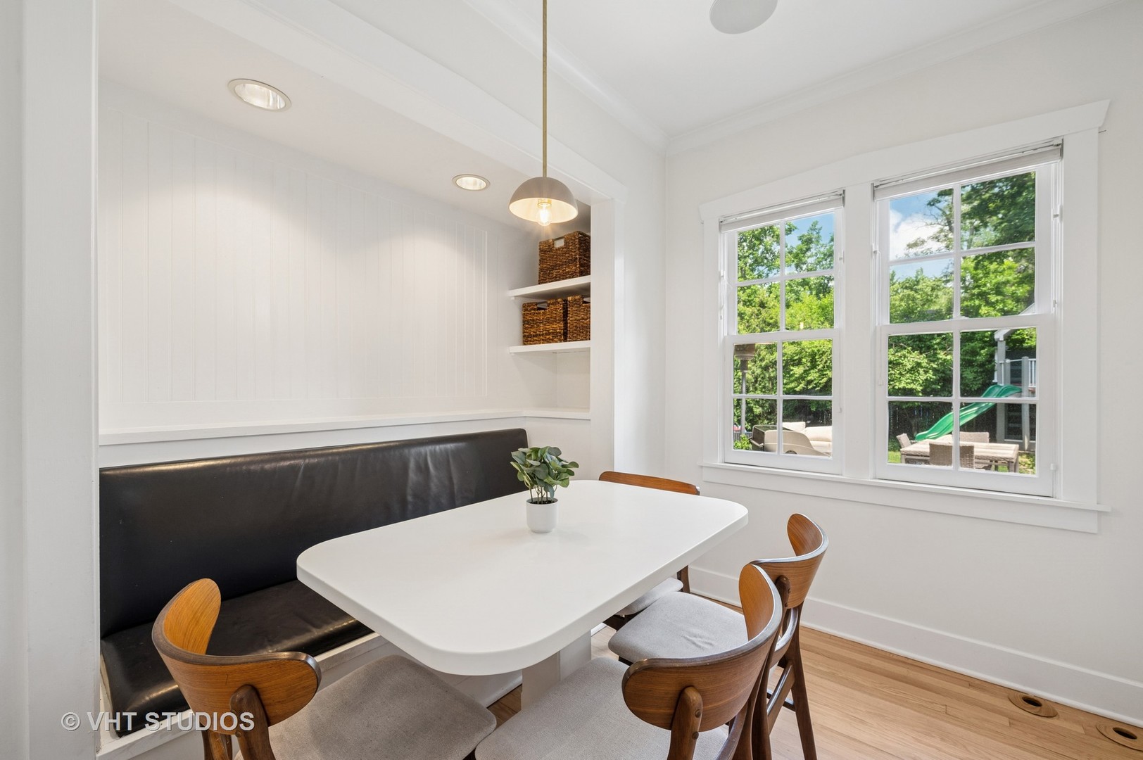 720 Willow Road Winnetka, IL 60093 - Photo 5 of 28 a view of a dining room with furniture wooden floor and chandelier
