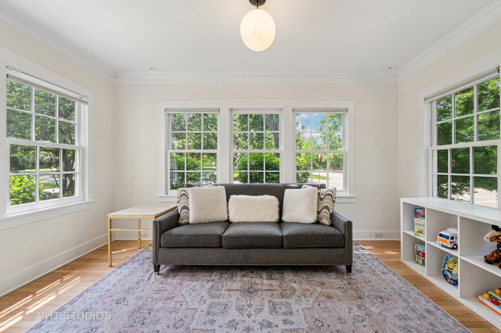 720 Willow Road Winnetka, IL 60093 - Photo 7 of 28 a living room with furniture and a window