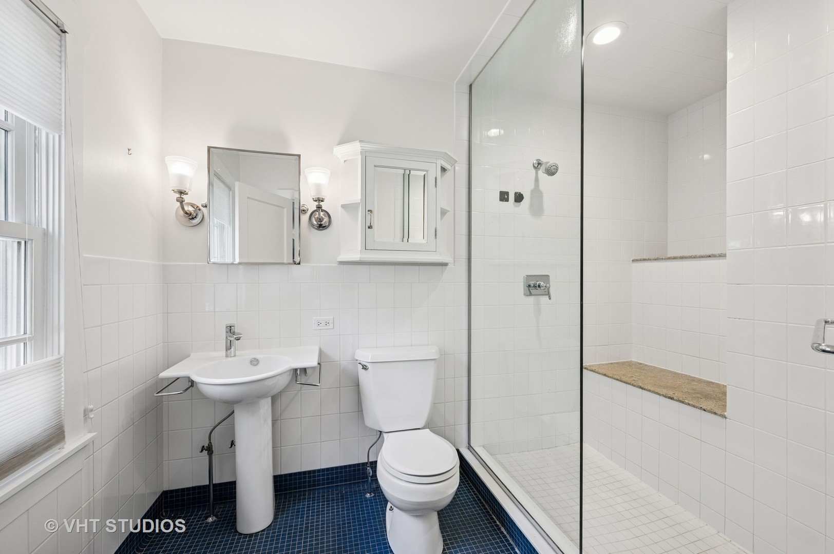 720 Willow Road Winnetka, IL 60093 - Photo 10 of 28 a bathroom with a sink toilet and shower