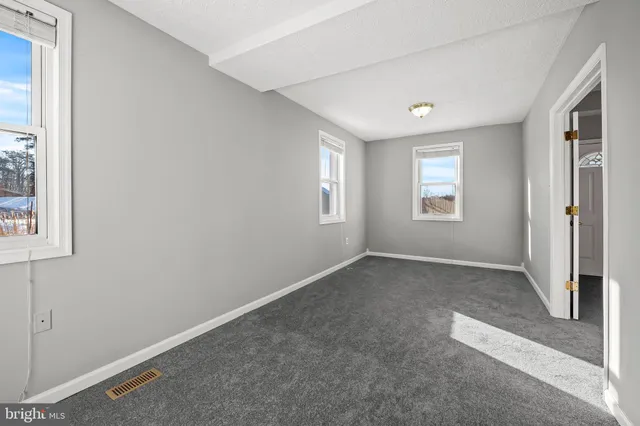 a bathroom with a sink a toilet and a bathtub