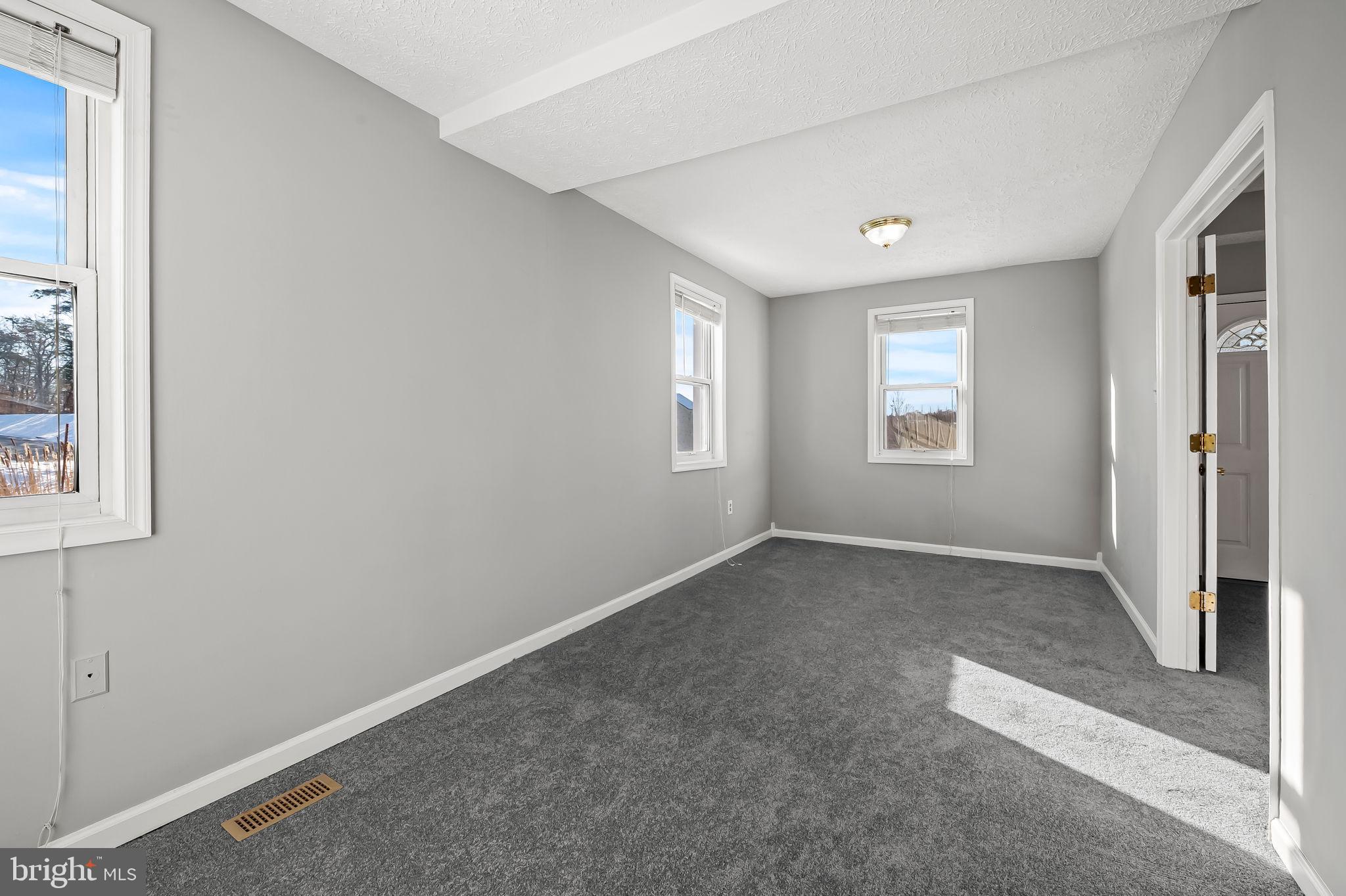 4222 Klosterman Avenue Nottingham, MD 21236 - Photo 16 of 43 an empty room with windows