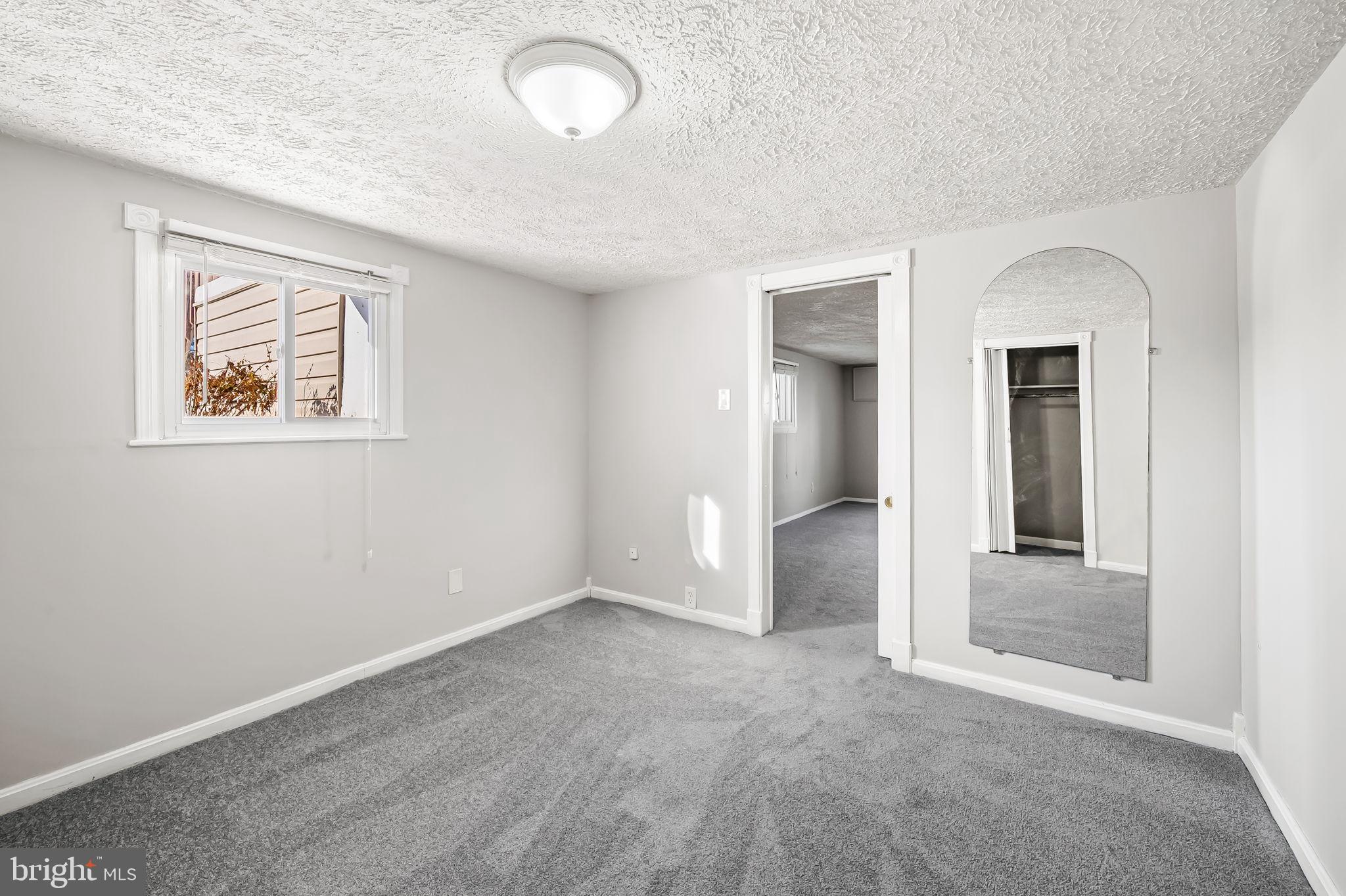 4222 Klosterman Avenue Nottingham, MD 21236 - Photo 32 of 43 an empty room with a window