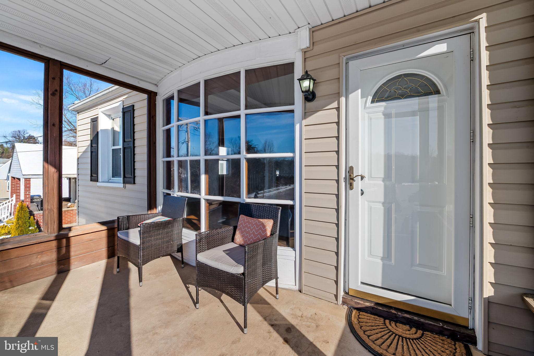 4222 Klosterman Avenue Nottingham, MD 21236 - Photo 4 of 43 a outdoor space with a large window and chair