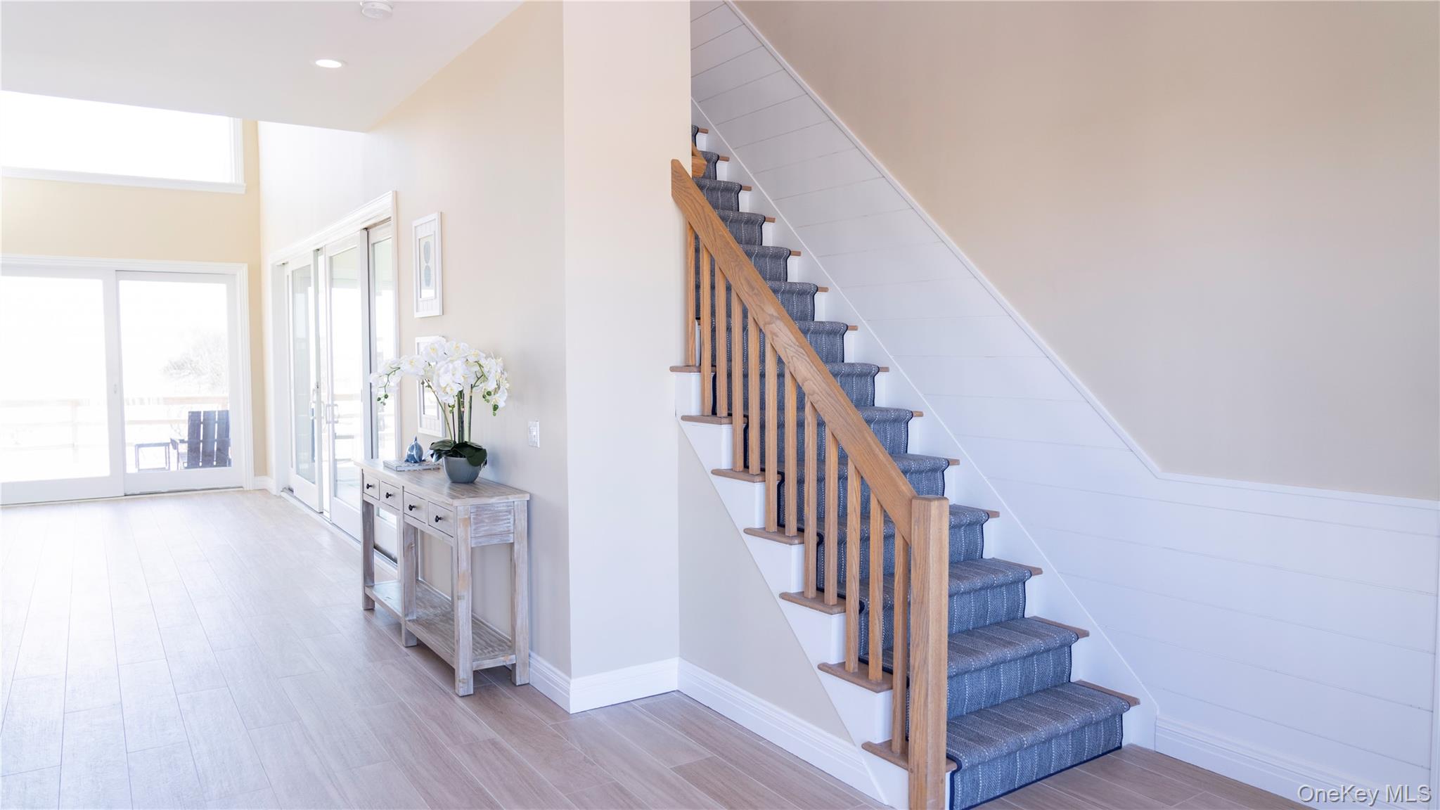 825 Dune Road Westhampton Beach, NY 11978 - Photo 25 of 50 a view of entryway and hall with wooden floor