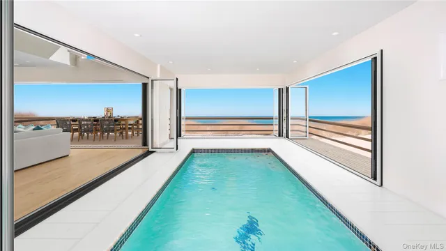 a front view of a house with yard and barbeque oven