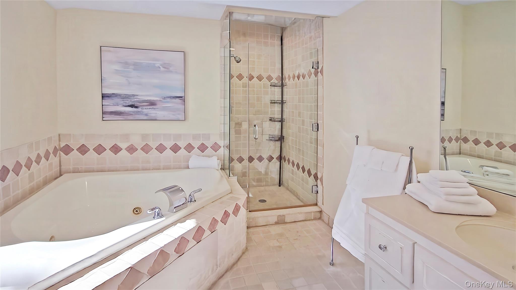 825 Dune Road Westhampton Beach, NY 11978 - Photo 31 of 50 a bathroom with a bathtub and a sink