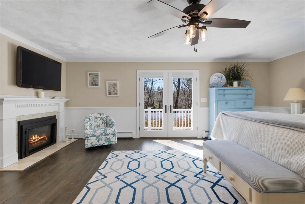 71 Porter Road Boxford, MA 01921 - Photo 14 of 37 a living room with furniture fireplace and flat screen tv